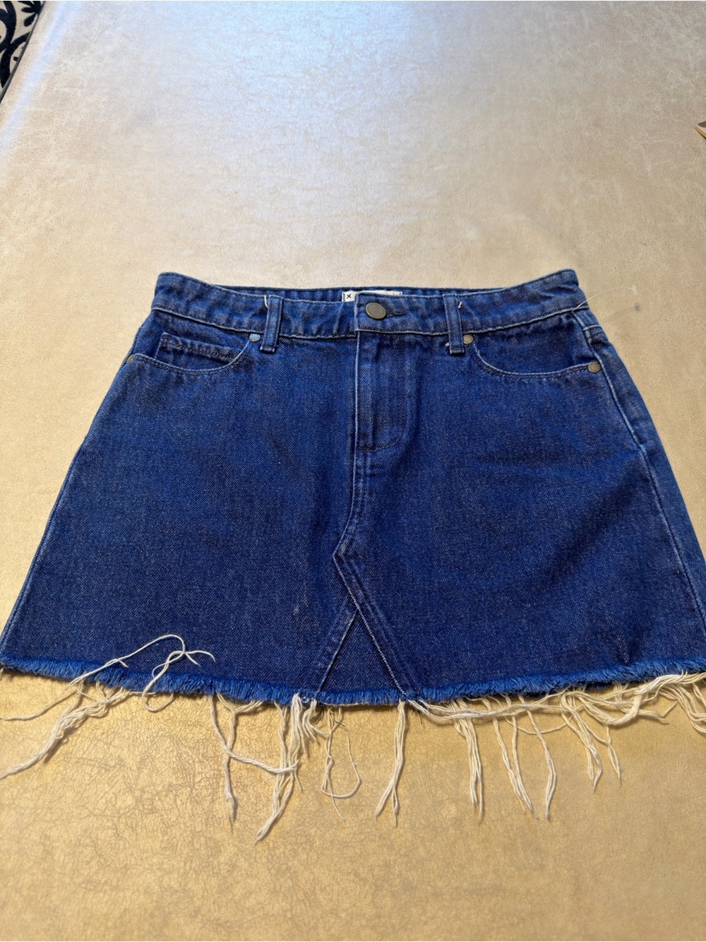 Paige Denim Skirt w/Raw Hem. Size 25